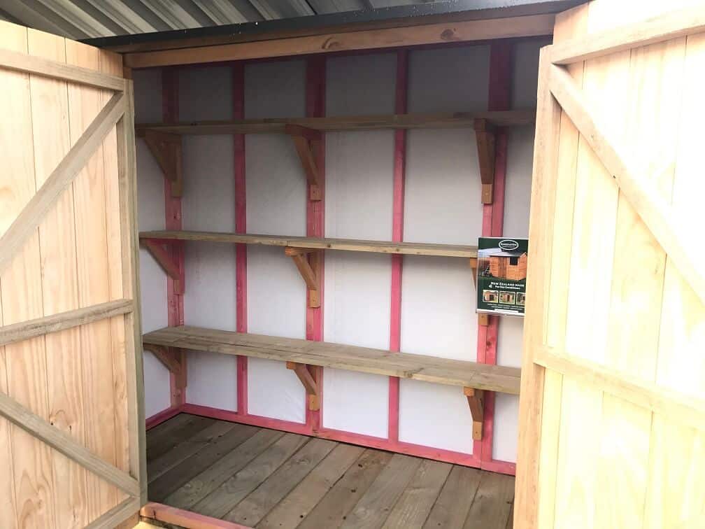 Shed with internal framing, lining and shelves